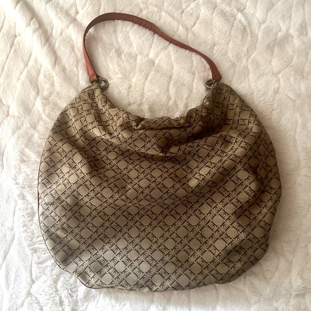 Authentic Carolina Herrera  canvas logo shoulder bag.
